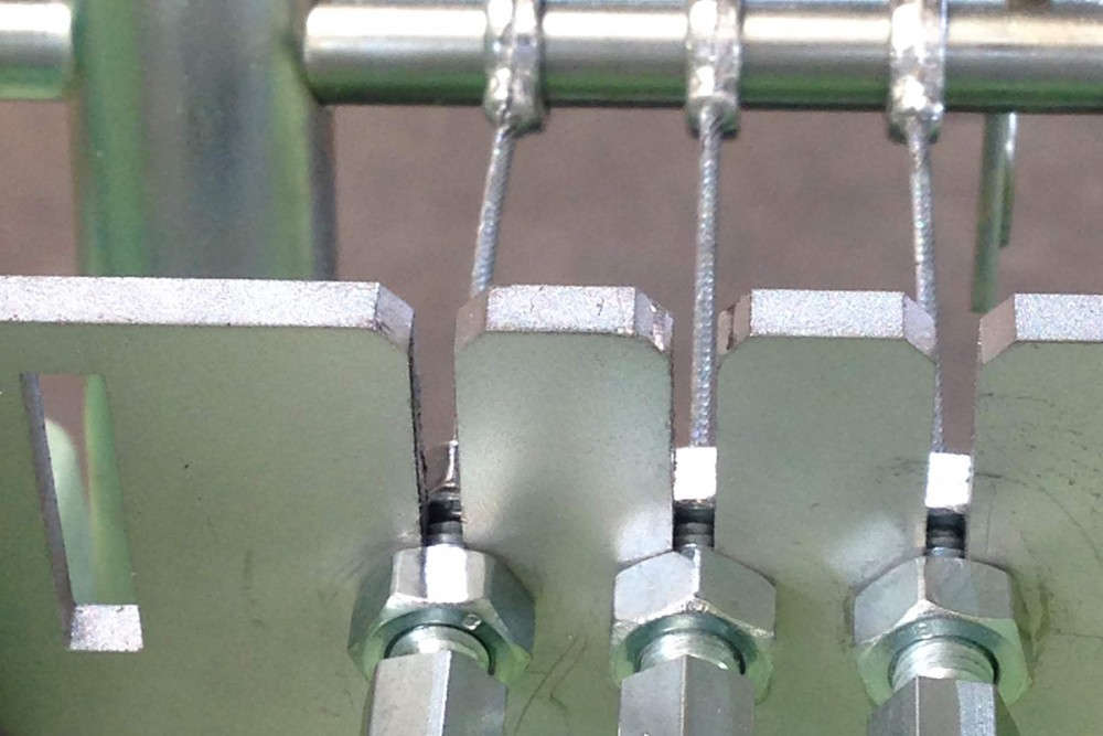 Câble de déverrouillage